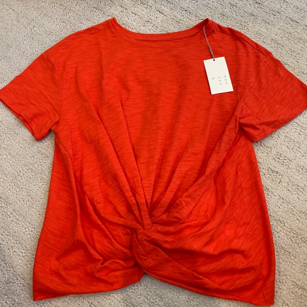 orangey red shirt